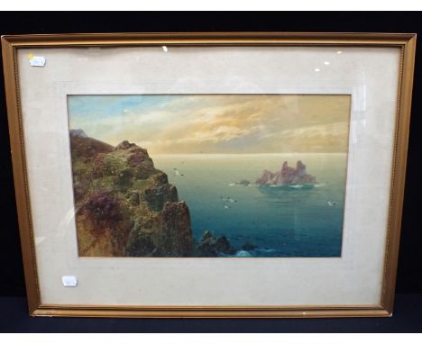 MANNER OF F.T. WIDGERY: SEASCAPE with cliffs and rocks, indistinctly signed 48 x 64cm framed (spotted)