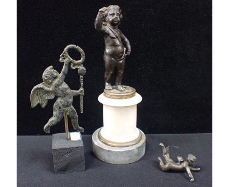 A FRENCH BRONZE PUTTI ON MARBLE PLINTH 22cm high, and two other bronze figures (3)