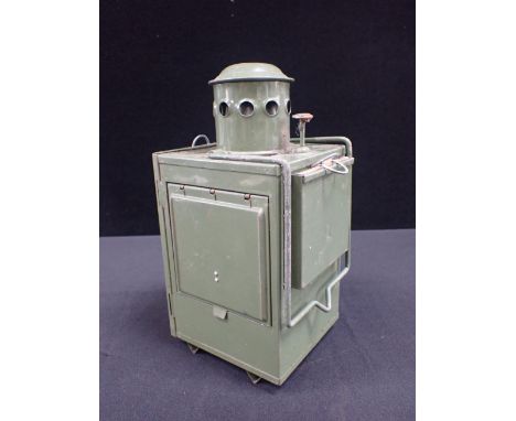 A SIGNALLING LAMP green painted with coloured glass filters 25cm high