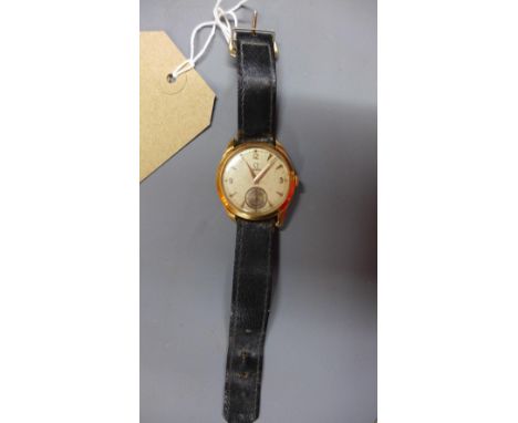 A vintage Omega 14ct gold gentleman's wristwatch, the dial with Arabic numerals at 3, 9 and 12, subsidiary seconds dial at 6,