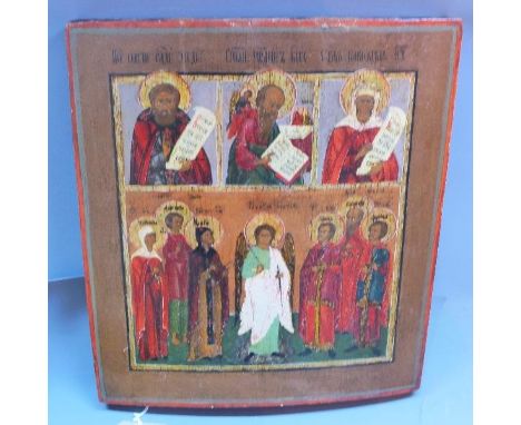 A Russian icon depicting an angel flanked by saints, with St Nicholas of Myra and other saints above, tempera on wooden panel