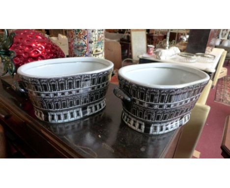 A pair ceramic planters with architectural design 