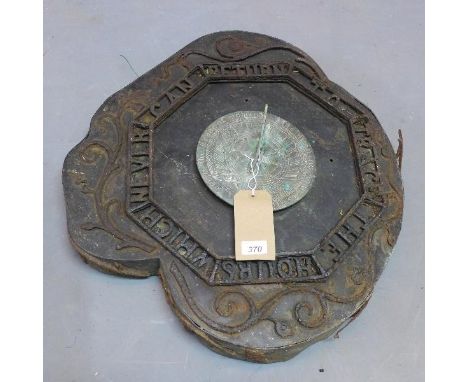 A garden sundial raised on base 