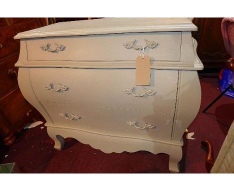 A Contemporary grey painted bombe commode, with three drawers, raised on cabriole legs, H.85 W.97 D.49cm 