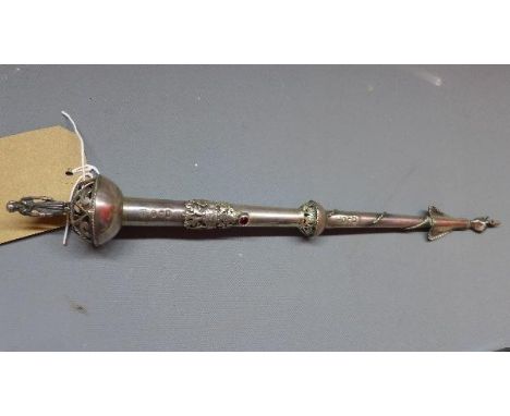 A Russian silver Torah pointer, Moscow 1870, possibly Viktor Vasilyevich Savinsky, with a figure of a Rabbi set on a pierced 