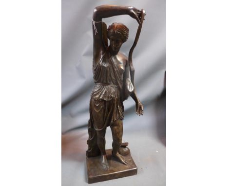 A Resin figural study of the Mattei Amazon, carrying a bow and sheath and is resting on her Pelta (shield) and double-bladed 