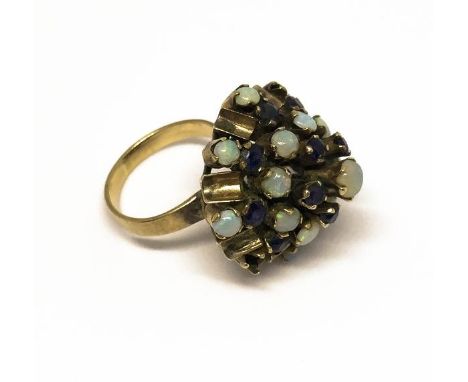 A Victorian yellow metal Harem cocktail dress ring, inset with opals and sapphires, probably gold, size I 1/2 (a/f) 