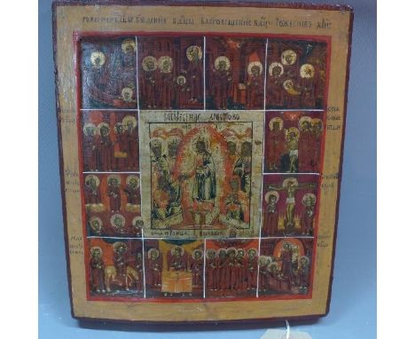 A Russian icon, Christ to centre flanked by the twelve Great Feasts, parcel gilded, tempera on wooden panel, 32 x 27cm 