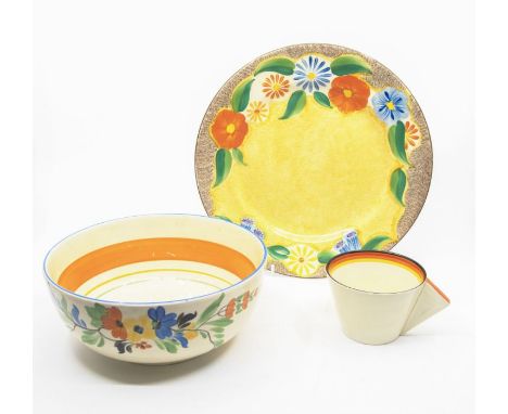 A Clarice Cliff Canterbury Bells plate, together with a Liberty Band conical cup and a Wilkinsons Honeyglaze bowl