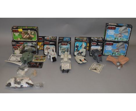 Seven boxed vintage Star Wars toys, mostly Kenner: Speeder Bike; two Ewok Combat Gliders; MTV-7; INT-4; MLC-3; Vehicle Mainte