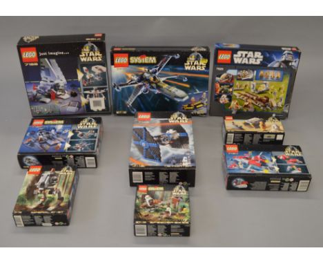 Nine boxed Lego Star Wars sets including 7140 X-Wing Fighter and 7146 Tie Fighter, some boxes sealed whilst others have been 