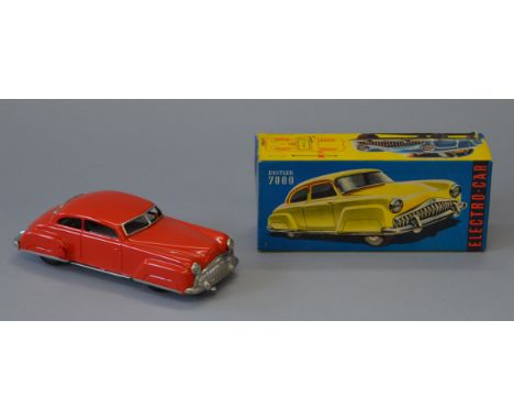 A boxed Distler  Electro Car 7000, a West German tinplate untested battery operated model with a clean battery compartment, a