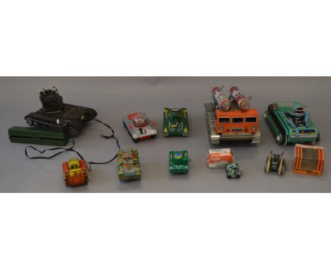 Ten model tanks, mostly unboxed in a variety of different scales and of  tinplate and plastic construction this lot includes 