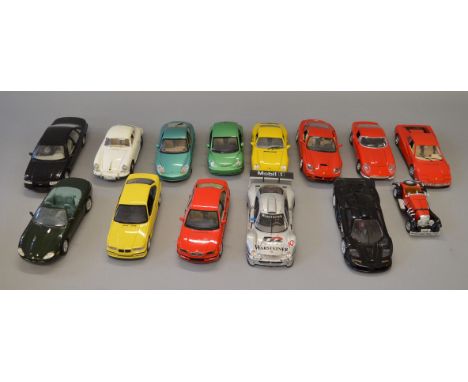 Fourteen unboxed diecast model cars in 1:18 scale by Bburago, Maisto and others, some with damage otherwise appear overall G.