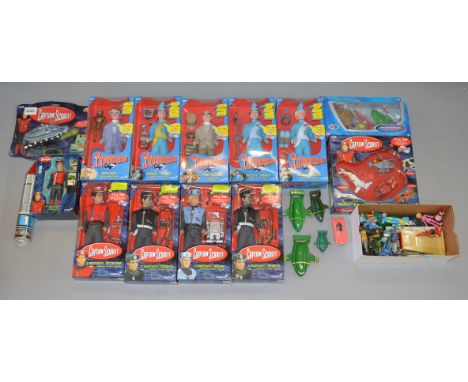 Nine boxed  Carlton talking action figures, five from the Thunderbirds TV series and four from Captain Scarlet, together with