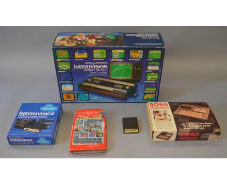 Mattel Electronics Intellivision games consul, voice synthesis module, Space Spartans & Lock N Chase games. Together with Bor