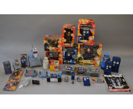 Eight boxed battery operated and clockwork Dr Who action toys together with five carded items and a quantity of unboxed items