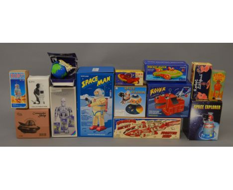 A group of  boxed, modern tinplate and plastic space themed and robot toys by Schylling and others. Models appear G+ in packa