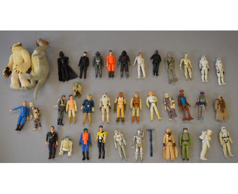 33 x vintage Kenner Star Wars action figures, including a Tauntaun and Wampa. Together with four other figures. Overall G. (3