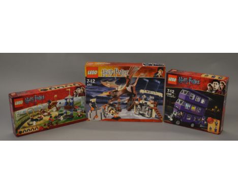 Three sealed boxed Lego Harry Potter Sets, 4767, 4737 Quidditch Match and  4866 The Knight Bus. 
