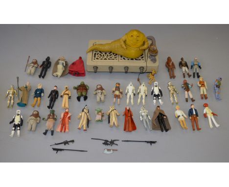 35 x Kenner Star Wars 3 3/4" action figures, many complete with weapons and accessories. Together with an unboxed Jabba the H