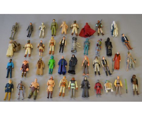 35 x vintage Kenner Star Wars 3 3/4" figures, some with accessories. Together with four modern Star Wars figures. F-VG.