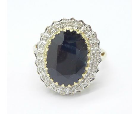 A 9ct gold, diamond and sapphire cluster ring, 5.1g, P