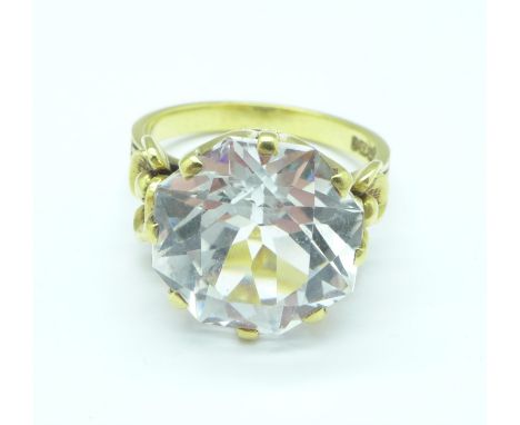 An 18ct gold and clear stone solitaire ring, 7.3g, O