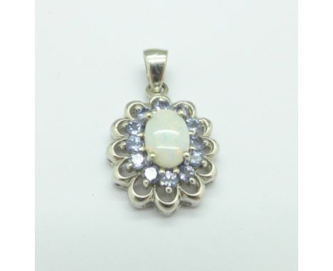 A 9ct white gold, opal and blue stone pendant, 2.2g