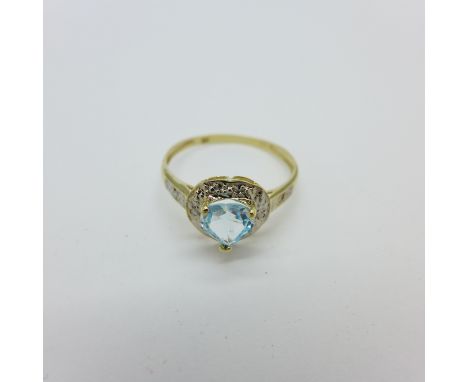 A 9ct gold, blue topaz and diamond ring, 1.1g, O