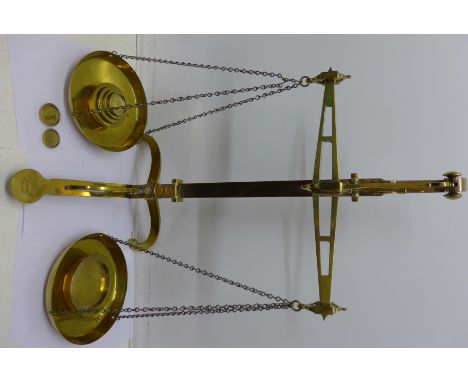 A set of Victorian brass bankers scales with sovereign weights, W.T. Avery