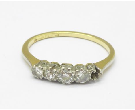 An 18ct gold, platinum set diamond ring, lacking one stone, 2.1g, N