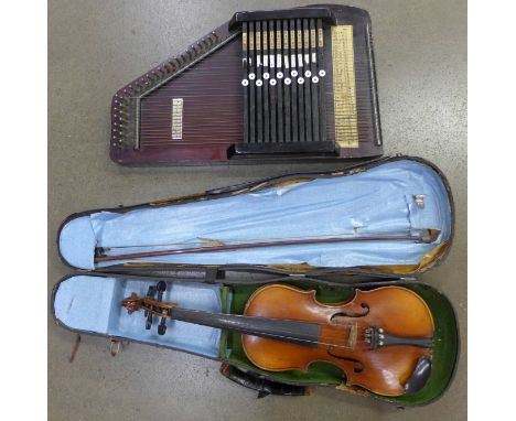 A violin and Auto harp, length of violin back 332mm