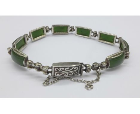 A silver and jade bracelet
