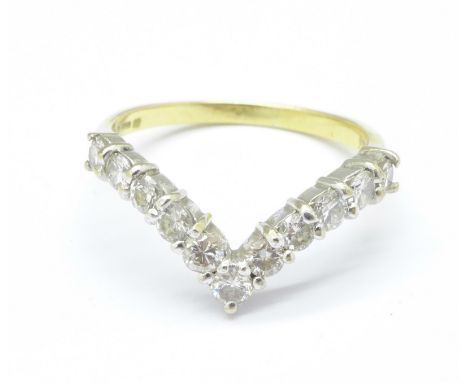 An 18ct gold and diamond wishbone ring, 3.1g, Q