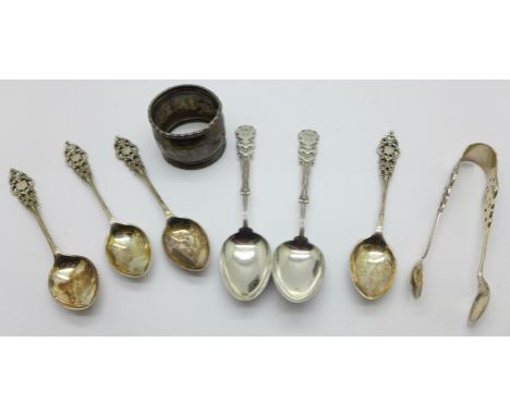 Six silver spoons, (4+2), a pair of silver sugar bows and a silver napkin ring, (napkin ring a/f), 152g