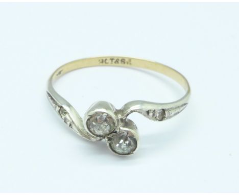 A 9ct gold and silver set crossover ring, P