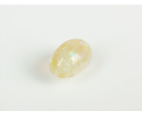 A loose opal, the oval opal cabochon weighing approx 4.25cts