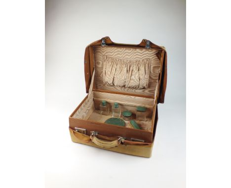 A collection of silver and enamel mounted dressing table wares, Goldsmiths &amp; Silversmiths Ltd Co, Birmingham, comprising;