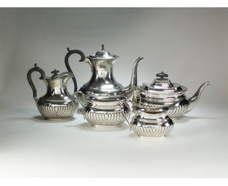 A five piece silver tea service, S S, London 1895 &amp; 1896, each piece of oval half reeded form, comprising; a coffee pot, 