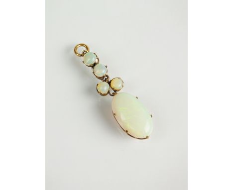 An opal pendant, designed as a large oval cabochon opal drop suspended from four circular cabochon opals, all mounted in yell