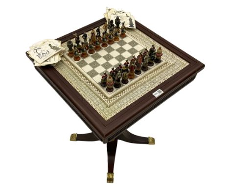 Franklin Mint Indian ' The Raj ' chess set with marble effect chess board within a mahogany stained frame raised on a brass m