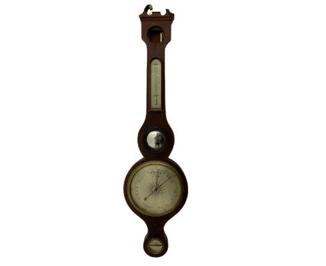 A mid Victorian mercury wheel barometer retailed by Thomas Grey of Newton Stewart, in a mahogany case with inlay to the edge,