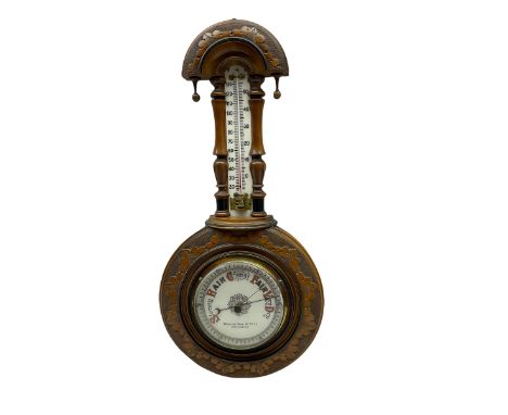 An Edwardian hall barometer with a compensated Aneroid movement by the German maker Julius Gischard, porcelain four-and-a-hal