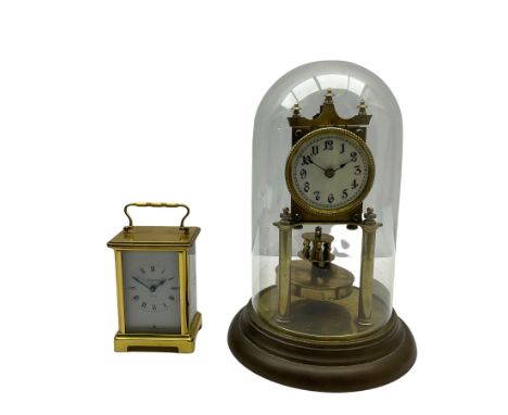 An unmarked late 19th century 400-day torsion clock under a glass dome, with a solid rotary pendulum, cream dial with Arabic 