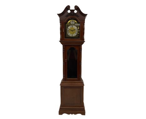 A 20th century three train longcase clock in a mahogany finished case with a swan neck pediment in the Georgian style, with a