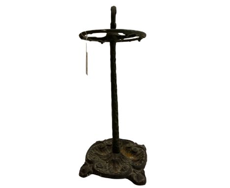 Cast iron stick and umbrella stand, the base cast with c-shape scrollsDimensions: Height:&nbsp;57cm&nbsp; Length/Width:&nbsp;