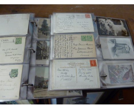 TWO ALBUMS OF VINTAGE POSTCARDS 