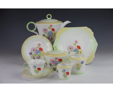 A Shelley china twenty five piece tea service, decorated with spring flowers, pattern number W.12072, comprising six cups, si