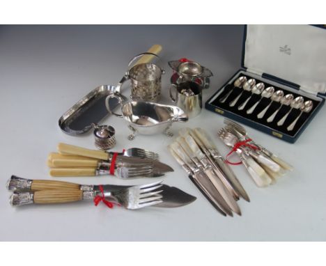 An assortment of silver plated cutlery and flatware, to include a pair of late Victorian silver serving spoons, a pair of bon